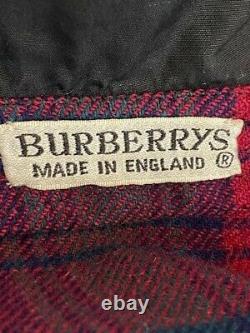BURBERRYS vintage reversible cape, poncho, black and red plaid OR Black. Zip arms