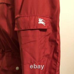 Burberry womans vintage windbreaker with hidden hat used