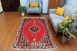 Tapis de zone traditionnel en laine rouge orientale vintage noué à la main de motif géométrique 4x6