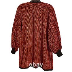 Vintage Valentino Miss V Made ITALY Wool Open Cardigan Coat Red Black Sz S M translated in French is:

Veste cardigan ouverte en laine rouge et noire Vintage Valentino Miss V fabriquée en ITALIE taille S M.